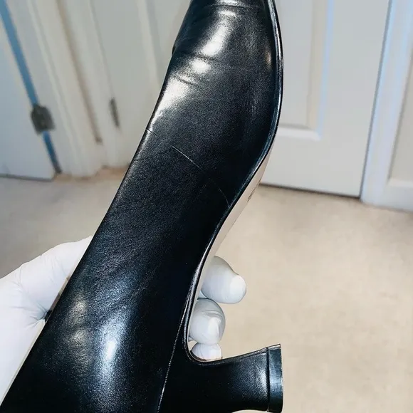 Nine West Black Leather Pumps.